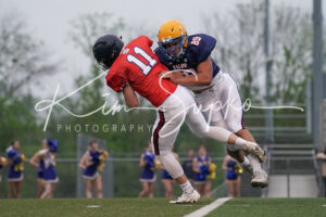 Aiden Nickleson tackles Andy Talone