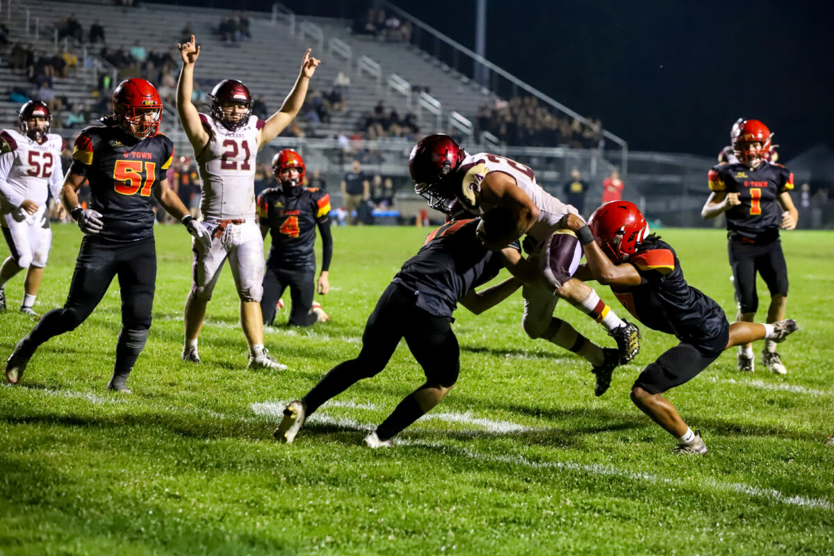 North East survives comeback attempt by Girard, wins 32-28 after weather delay (PHOTO GALLERY)